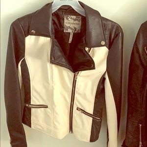 Black and white body central leather jacket